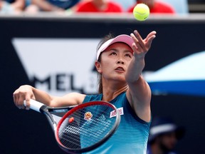 FILE PHOTO: A file photo of China's Peng Shuai serving during a match at the Australian Open on January 15, 2019. REUTERS/Edgar Su/File Photo/File Photo