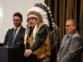 Grand Chief Brian Hardlotte, centre, speaks at an event to sign a Memorandum of Understanding between the Prince Albert Grand Council and Saskatchewan Polytechnic in Saskatoon on Friday, Dec. 10, 2021.