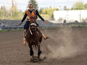 A celebratory finish during the Indian Relay Races home opener at Marquis Downs, May 30, 2021.