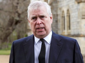 Britain's Prince Andrew speaks to the media during Sunday service at the Royal Chapel of All Saints at Windsor Great Park, following the death of his father Prince Philip at age 99, April 11, 2021.