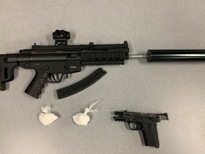 A rifle with a high-capacity magazine, a homemade suppressor, a handgun, and about 54 g of cocaine were seized from a home in the 100 block of Cartier Cres. in Saskatoonon on Dec. 17.