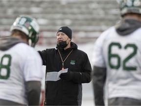 Saskatchewan University Huskies head coach Scott Flory speaks to players during practice, in Quebec City, Friday, Dec. 3, 2021. Western University Mustangs and Huskies will play for the Vanier Cup on Saturday Dec. 4 at Laval University.