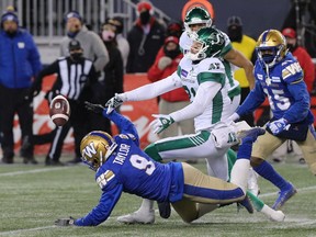 Winnipeg Blue Bombers defensive back Nick Taylor, 9, breaks up a pass that was intended for Saskatchewan Roughriders receiver Mitch Picton. Taylor's deflection secured a 21-17 victory for Winnipeg in Sunday's CFL West Division final.
