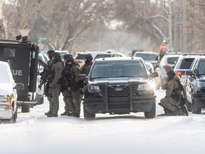 Police had the 200 block of Avenue L North cordoned off as they negotiated with people inside a house on Monday, Jan. 10, 2022.