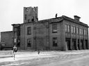A photo of the demolition starting on Fire Hall No. 2 on Market Square at 21st Street and Avenue B, in preparation for construction of the new fire department headquarters, from Jan. 13, 1964.