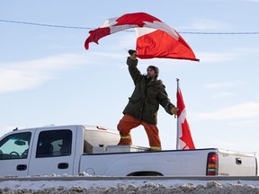 Hundreds gathered at 3850 Idylwyld Dr. North in support of a convoy of truckers who passed through town to protest vaccine mandates on Monday, Jan. 24, 2022.