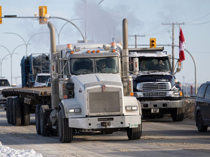 Hundreds gathered at 3850 Idylwyld Dr. North in support of a convoy of truckers who passed through town to protest vaccine mandates on Monday, Jan. 24, 2022.