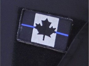 An example of a Thin Blue Line patch, worn by a Montreal police officer.