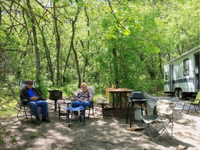 William and Theresa Anderson sit in their campsite in Echo Valley Provincial Park on June 5, 2020.