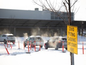 Vehicles line up at a Covid-19 testing site off University Park Drive in Regina.