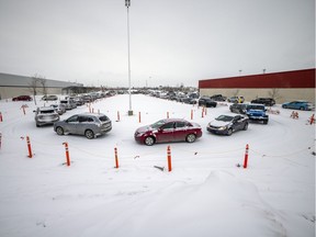 The lineup to for the drive-thru COVID-19 testing at the old Costco building extended well beyond the parking lot and spilling all the way back along Victoria Avenue  on Tuesday, January 4, 2022 in Regina.