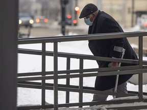 Former Regina doctor Sylvester Ukabam, 76, seen here walking into Regina's Court of Queen's Bench on Jan. 12, faces seven charges of sexual assault.