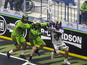 Saskatchewan defenders Jeff Cornwall and Tristan Rai chase San Diego's Wesley Berg during a game earlier this season.