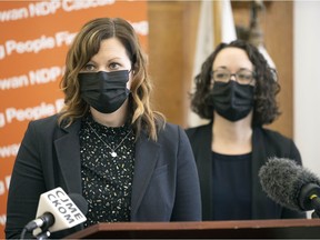 Opposition health critic Vicki Mowat, left, and Official Opposition Deputy Leader Nicole Sarauer speak with the media at the Legislative Building.