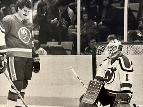 Clark Gillies of the New York Islanders, left, and Glenn (Chico) Resch of the New York Islanders are shown during the 1982-83 NHL season. Gillies and Resch were teammates with the Islanders from 1974 to 1980.