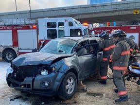 The Saskatoon Fire Department extricates a person from a vehicle after a crash on Monday, Jan. 24, 2022.