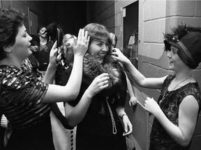 A photo of University of Saskatchewan College of Home Economics students celebrating the college’s 50th anniversary with a Five Decades of Fashion show, from Feb. 3, 1978.