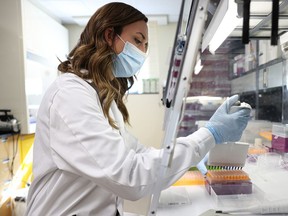 Research technician Jenna Cantin prepares samples of wastewater at the University of Saskatchewan's wastewater testing facility which will then be analyzed to glean insight into how COVID-19 might be spreading in Saskatoon and other areas in Saskatchewan. Photo taken in Saskatoon on Thursday, Sept. 30, 2021.