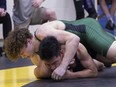 Athletes compete at the Dual Wrestling City Championships at E.D. Feehan Collegiate on Tuesday, February15, 2022. Holy Cross won the boys title with Marion Graham taking the girls championship. Photo by Colin Chatfield.