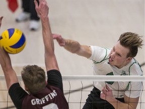 University of Saskatchewan Huskies outside hitter Levi Olson hits the ball against the MacEwan University Griffins in U Sports men's volleyball action at the PAC on the U of S campus in Saskatoon on Saturday, January 4, 2020.