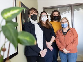 Anne Arguin, Brett Neault, Devan Moxley-Teigrob and Pam Komonoski stand for a photo in the Student Wellness Centre at the University of Saskatchewan.