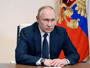 Russian President Vladimir Putin chairs a video meeting with members of Russia's Security Council on March 3, 2022. “I will never give up on my conviction that Russians and Ukrainians are one people,” he said.