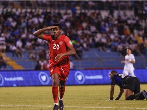 Canada's Jonathan David celebrates scoring his side's second goal against Honduras during a qualifying soccer match for the FIFA World Cup Qatar 2022 in San Pedro Sula, Honduras on Jan. 27, 2022.