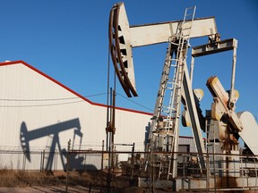 An oil pumpjack pulls oil from the Permian Basin oil field in Odessa, Texas.