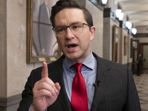 Conservative MP for Carleton Pierre Poilievre speaks with the media before attending Question Period, Wednesday, February 16, 2022 in Ottawa.