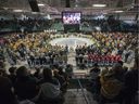 Family and friends light candles during the Humboldt Broncos first year memorial service at the Elgar Petersen Arena in Humboldt, Saskatchewan.  Saturday, April 6, 2019.