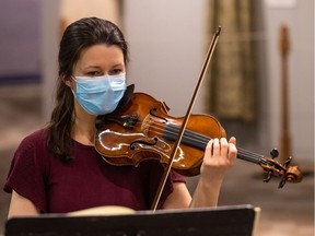 Veronique Mathieu rehearses with one of the Amati violins on April 18, 2022.