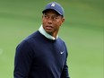 Tiger Woods warms up on the range during a practice round prior to the Masters at Augusta National Golf Club on April 5, 2022 in Augusta, Georgia.