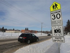 Photo radar warning signs on a school zone on Clarence Avenue in Saskatoon are seen in this December 2014 photo.