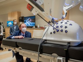Merlis Belsher admires the Da Vinci surgery system.