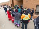 Supporters gathered outside the Provincial Courthouse after a hearing for the woman charged with impaired driving (by THC) who struck and killed nine year old Baeleigh Maurice on Sept. 9, 2021. The woman, who has not yet been identified, appeared by video call. Photo taken in Saskatoon, SK on Tuesday, April 12, 2022.