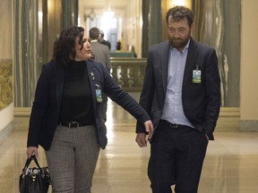 Brennon Dulle, joined by his wife Gillian, walk away from the rotunda of the Legislative Building on April 12, 2022 in Regina. Brennon is waiting on his third brain surgery and it has not been scheduled yet.
