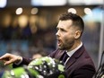 Saskatchewan Rush head coach Jimmy Quinlan speaks to his players during Saturday's NLL win over the Colorado Mammoth.