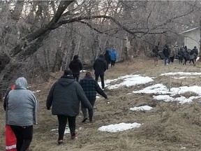 A team of searchers looks for five-year-old Frank Young, who was last seen at his residence on Red Earth Cree Nation on April 19, 2022. (Provided: Prince Albert Grand Council)
