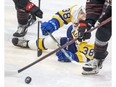 Saskatoon Blades forward Trevor Wong (38) watches a loose puck during third period WHL playoff action. The Saskatoon Blades defeated the Moose Jaw Warriors 5-3 in game 4 of the series in Saskatoon on Wednesday, April 27, 2022.