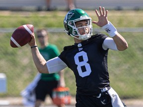 Quarterback Mason Fine, shown Thursday at the Saskatchewan Roughriders' rookie camp, was impressive Friday even though the sun turned to showers.