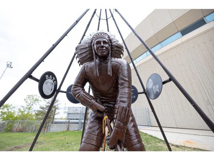  The Fred Sasakamoose bronze statue is unveiled at SaskTel Centre in Saskatoon on May 18, 2022.
