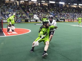 Rush defender Mike Messenger carries the ball during a late-season game at SaskTel Centre against Calgary.