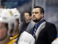 Saskatoon Blades head coach Brennan Sonne watches the play during first period WHL playoff action in Saskatoon, SK on Wednesday, April 27, 2022.