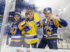 Young fans celebrate after watching the Saskatoon Blades defeat the Moose Jaw Warriors 5-3 in Game 4 of the series in Saskatoon on Wednesday, April 27, 2022.