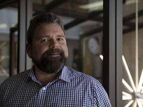 CEO of Prairie Clean Energy, Mark Cooper stands for a portrait at his offices on Monday.