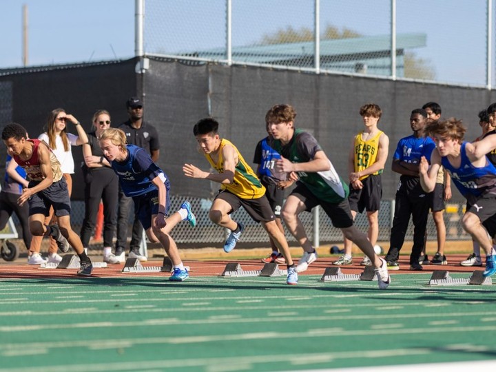  Athletes are ready to race out of the starting blocks at the high school track and field city championships on May 25 and 26 at Gordie Howe Sports Complex. Photo shows action from Saskatoon high school mini track meet in May 2022. Photo by Vic Pankratz.