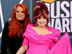 Wynonna Judd, left, and Naomi Judd, right, attend the 2022 CMT Music Awards at Nashville Municipal Auditorium, April 11, 2022.