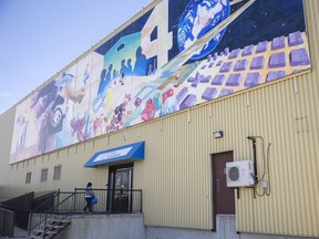 A person walk into the Regina Food Bank on Monday, May 16, 2022 in Regina. . The food bank is seeing about double the demand of pre-pandemic levels.