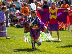 Hudson Penner, a two-spirit youth, dances at The Heart of The Youth pow wow in Prince Albert. This year the pow wow eliminated gender categories to embrace two-spirit youth in pow wow circles.