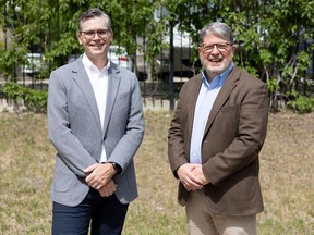 Chad Vickery, left, vice president of global strategy and technical leadership at the International Foundation for Electoral Systems (IFES), and Michael Boda, Saskatchewan's chief elections officer,  stand for a photo outside the Bessborough Hotel. They are just back from  a trip up north, where they and the rest of Elections Saskatchewan are working on expanding voter access. Photo taken in Saskatoon, Sask. on Wednesday, June 8, 2022.